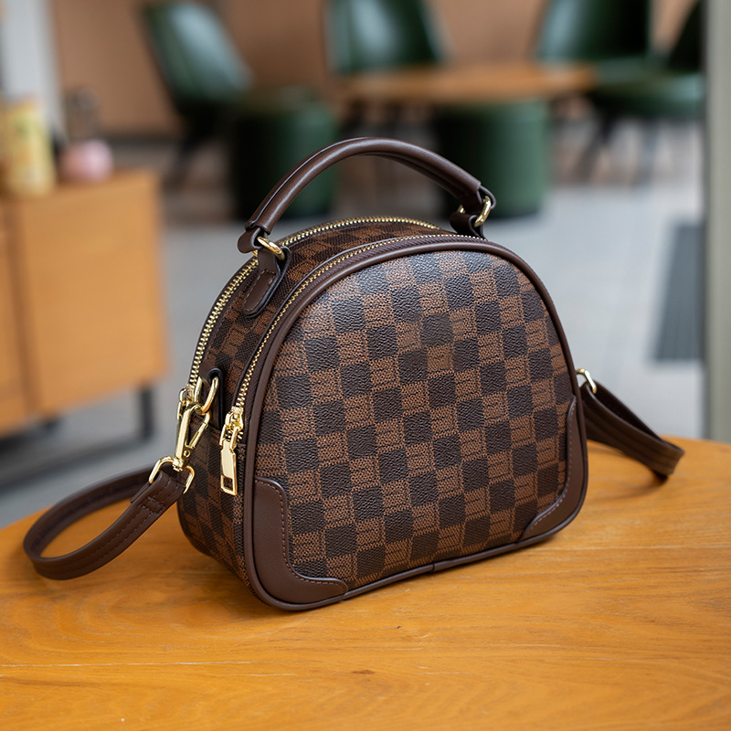 **Brown and black plaid shoulder bag**